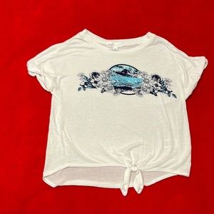 A White short sleeve with blue flowers and a surfer (girls)
